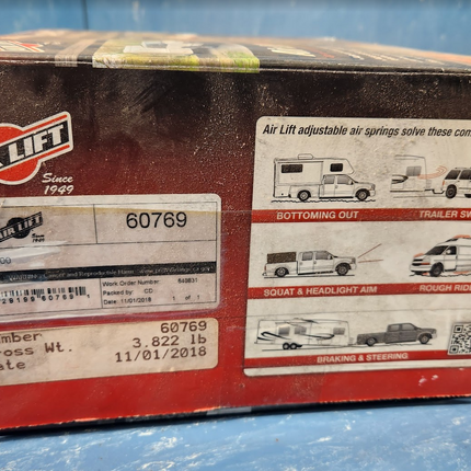 Air Lift 60769 Air Lift 1000 Coil Spring NEW 729199607691 Tahoe Yukon Suburban - getexcess