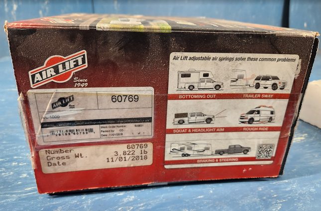 Air Lift 60769 Air Lift 1000 Coil Spring NEW 729199607691 Tahoe Yukon Suburban - getexcess